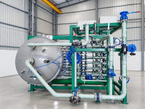 Skid-mounted FUNDABAC® candle filter for viscose spin bath filtration, front view of the automated valves and piping